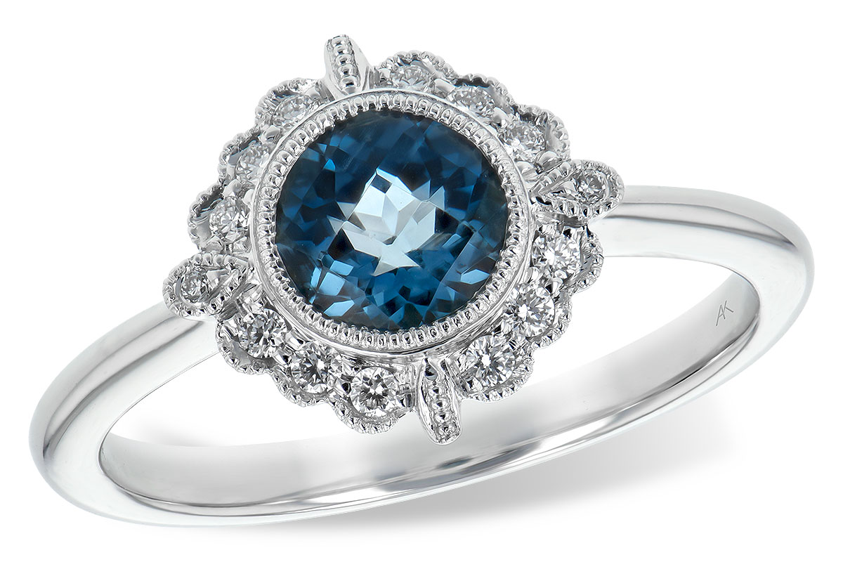 G235-29027: LDS RG .93 BLUE TOPAZ 1.05 TGW